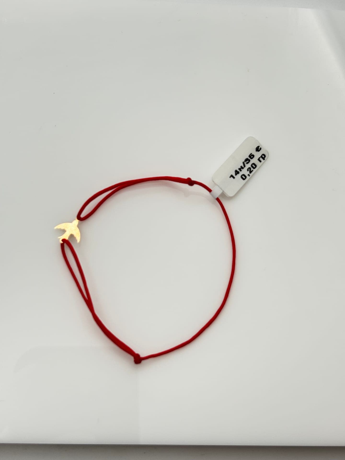 Дамска гривна с червен конец и златна птица 14К, бижу като наградите от giveaway-ите на АСИ БИЖУ